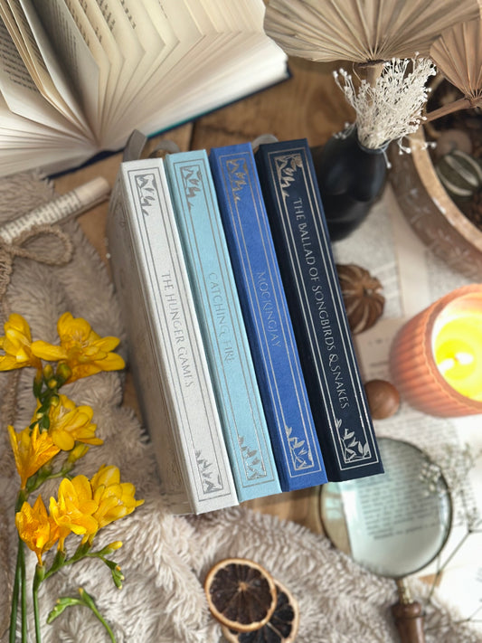 The Hunger Games Trilogy by Suzanne Collins plus The Ballad of Songbirds and Snakes | Handmade, Rebind, Special Edition