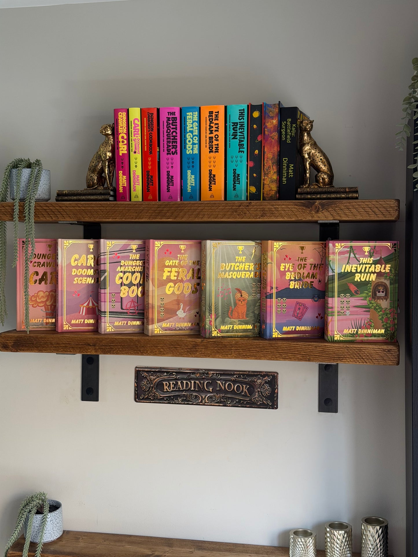 Dungeon Crawler Carl series by Matt Dinniman - The Royal Court of Princess Donut editions - book rebinds